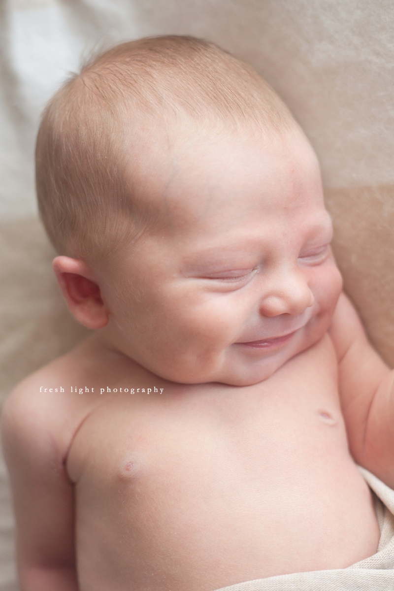 smiling newborn baby houston