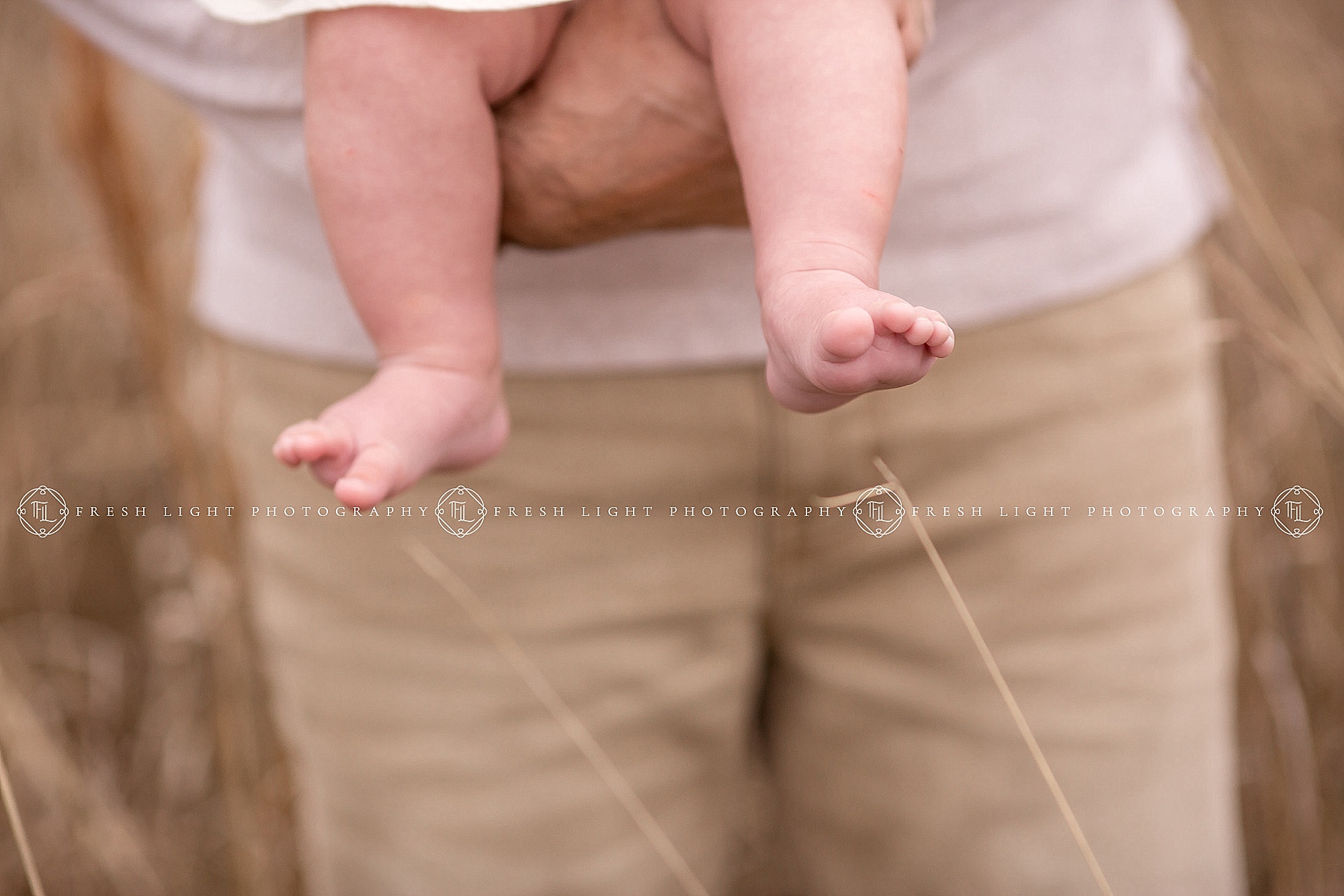 Baby toes at family outdoor photography session in Houston