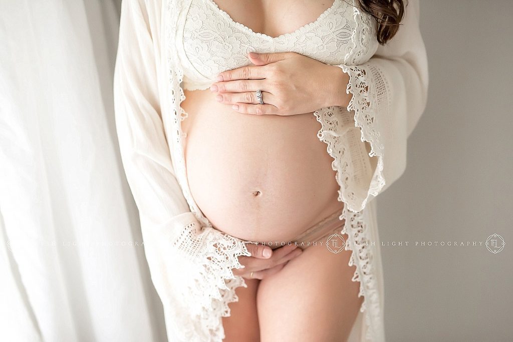 bare pregnant belly photographer by Houston's fresh light photography