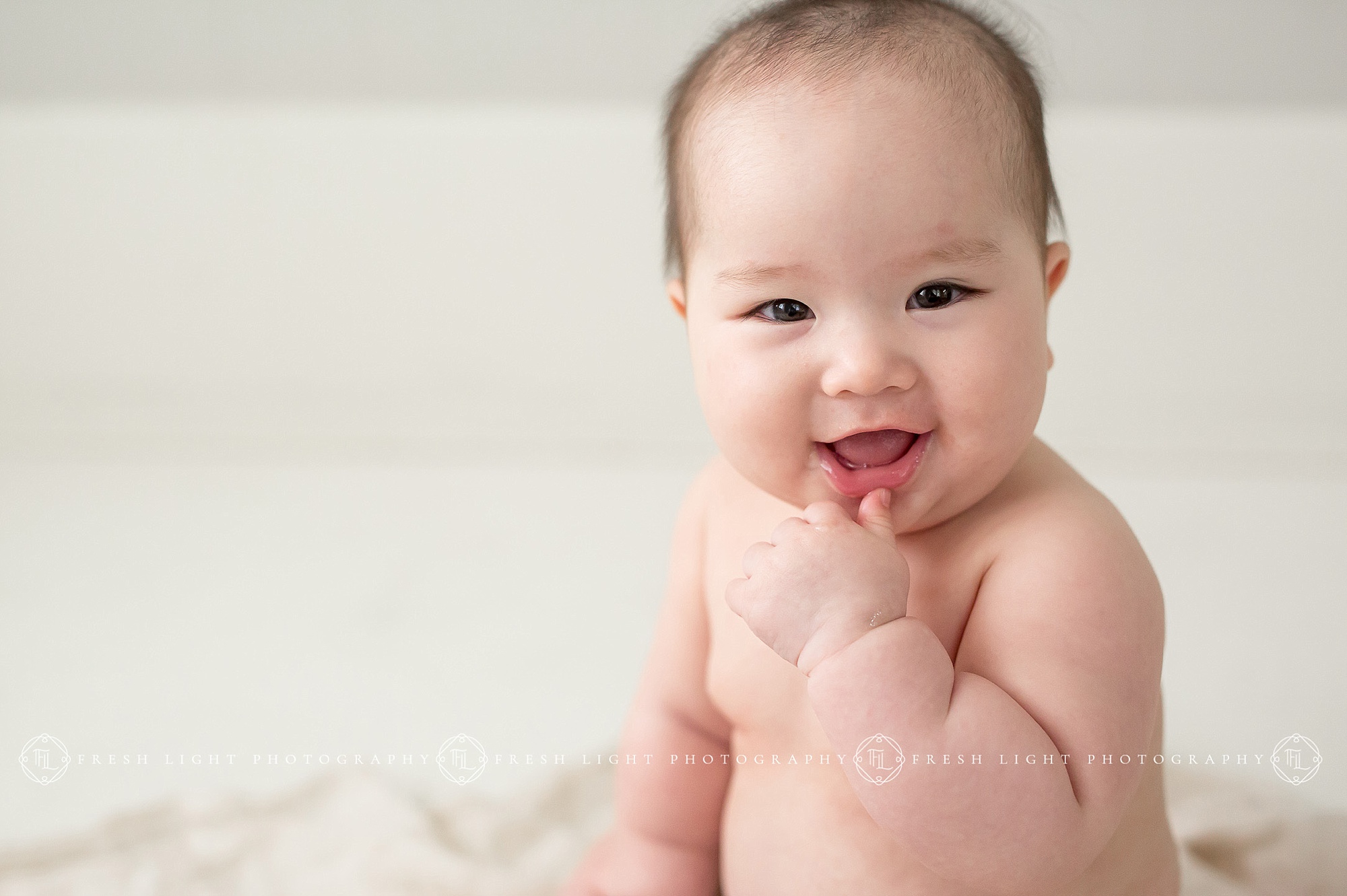 Close up of baby girl in natural light Houston Studio