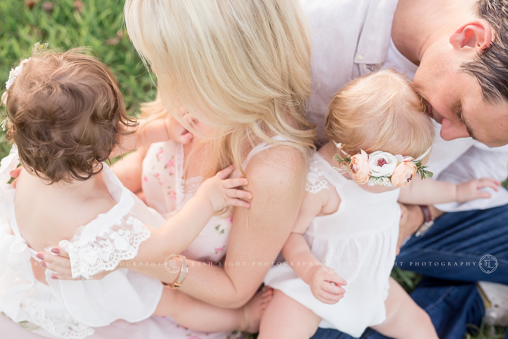 Mom and dad with children outside