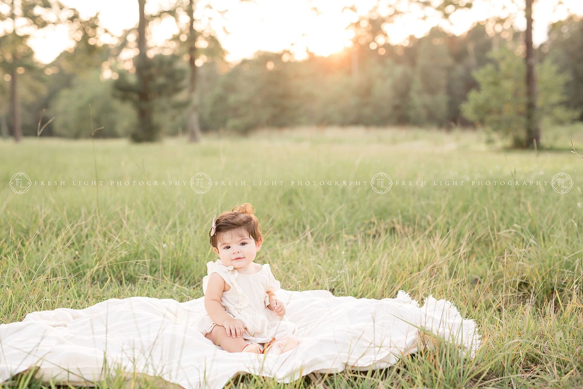 Baby child on blanket outdoors