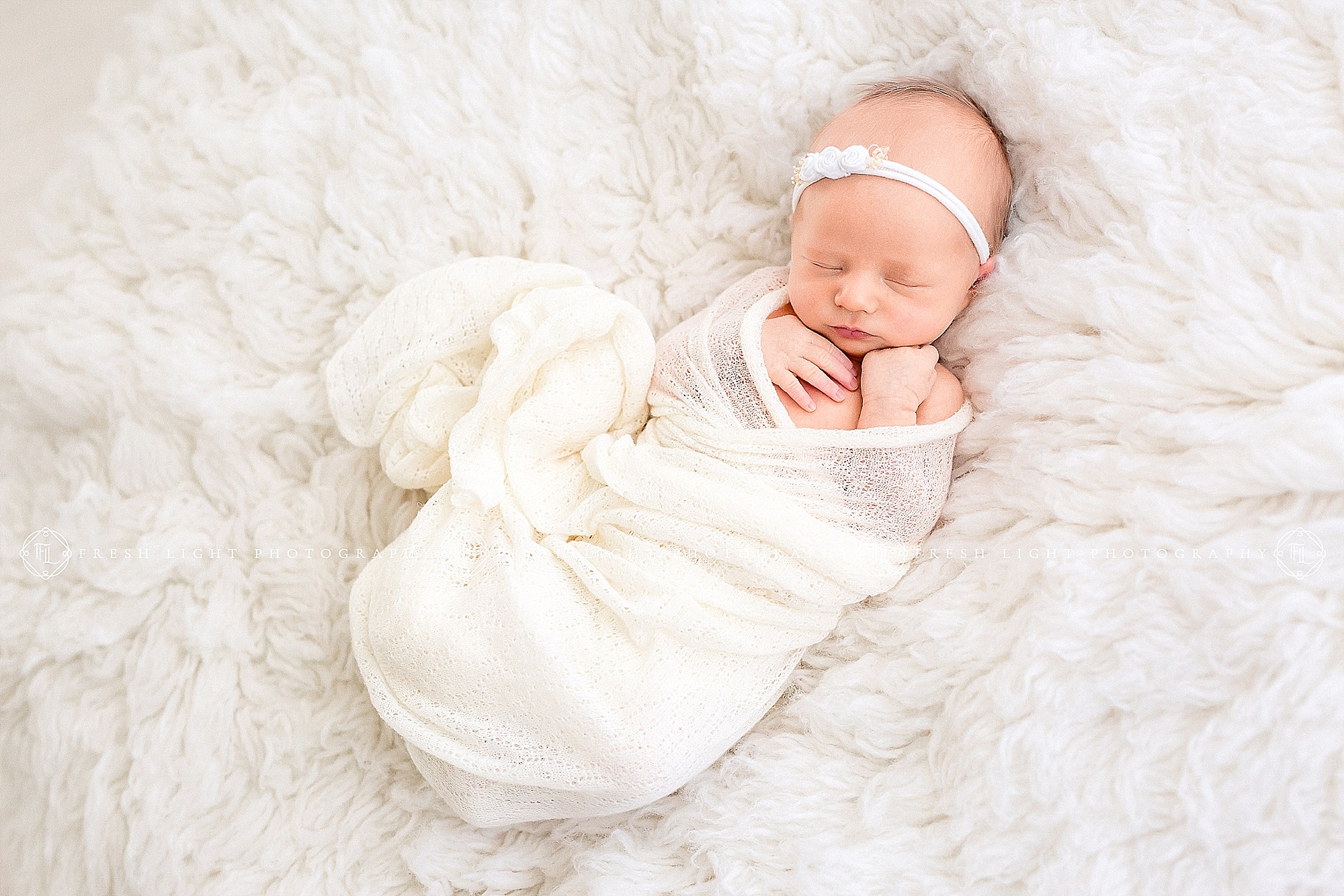 Newborn on blanket