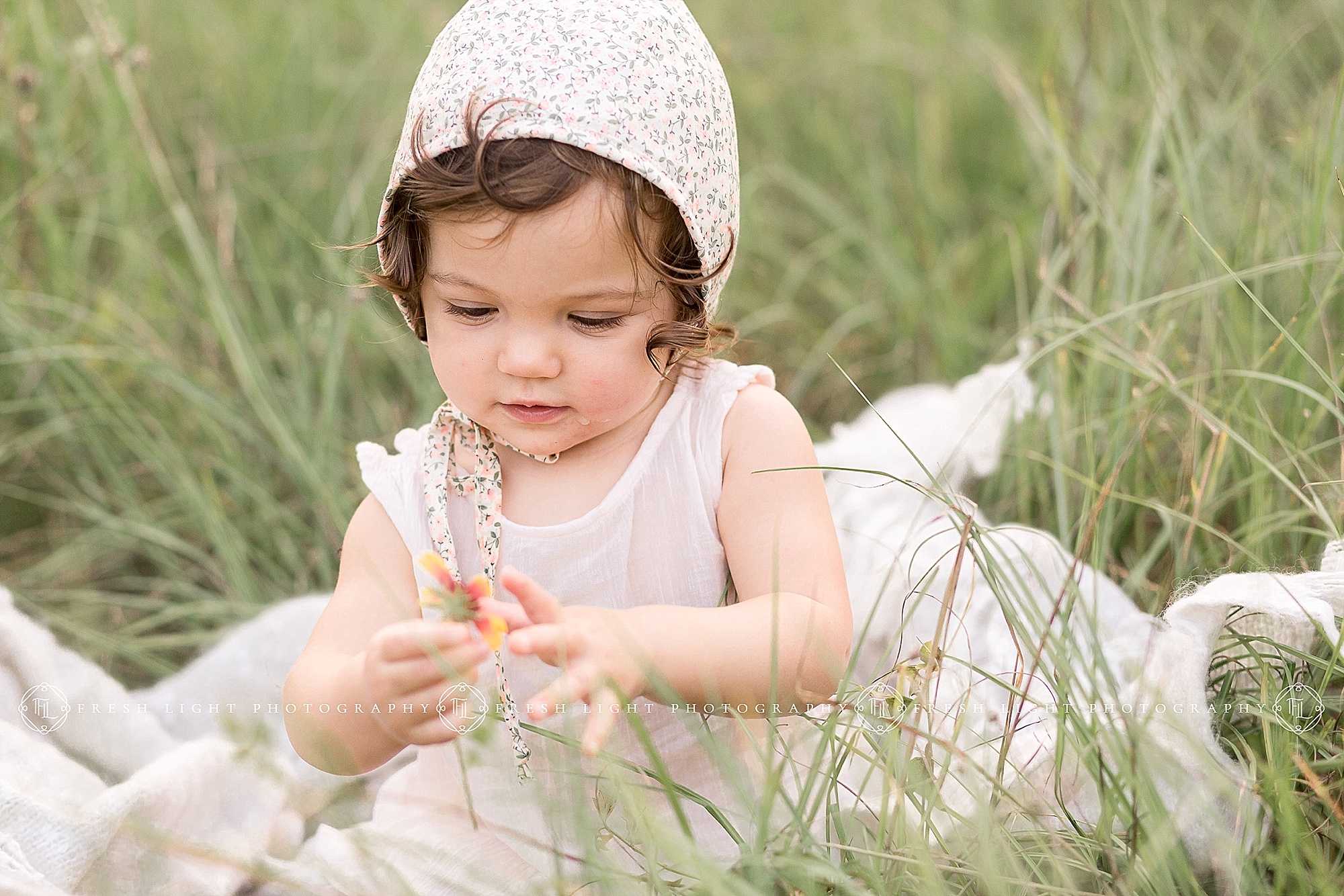 Infant girl in field