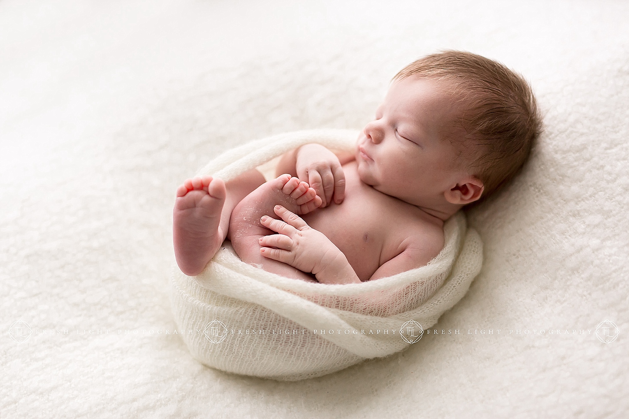 Swaddled newborn