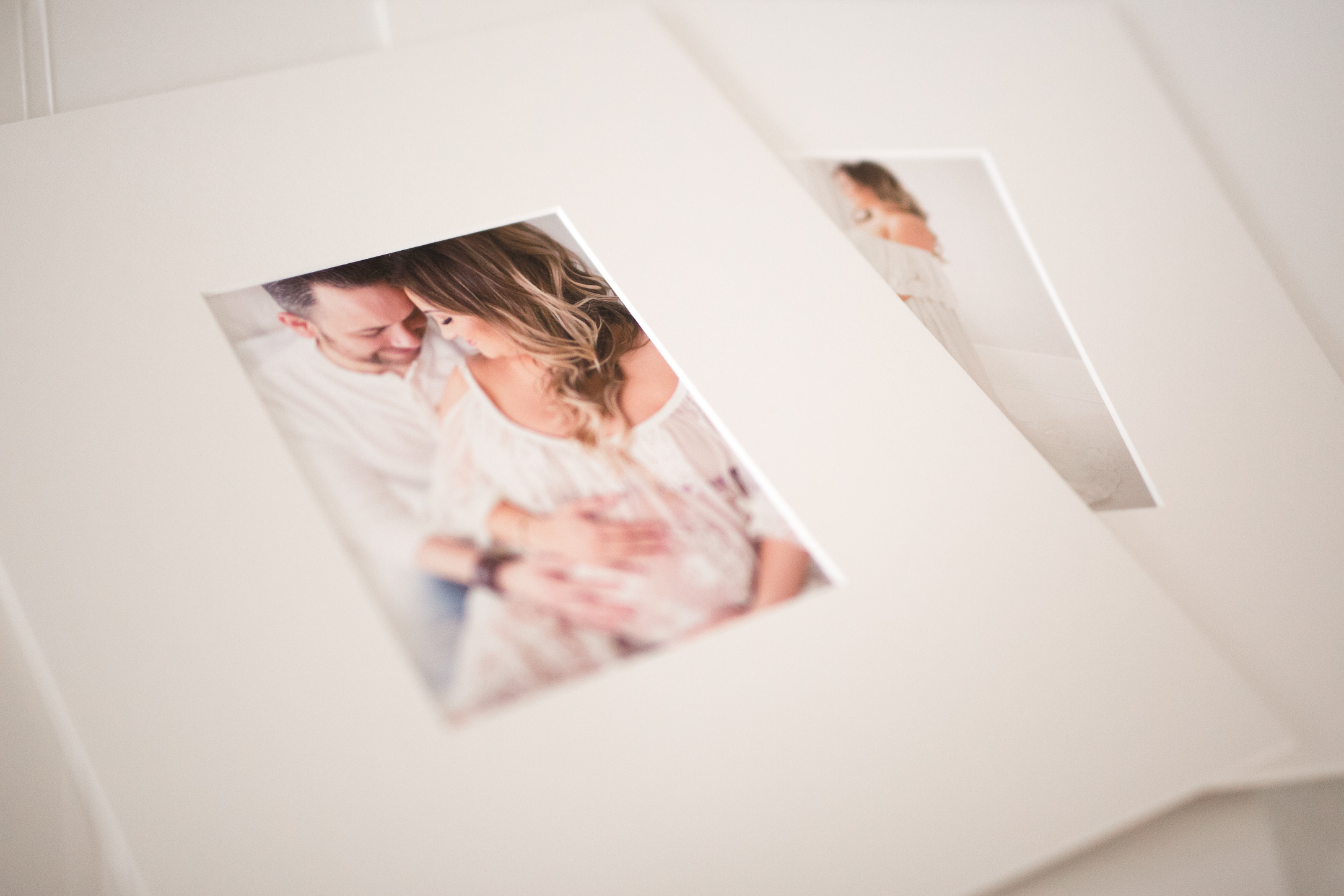 two matted prints from a houston maternity session