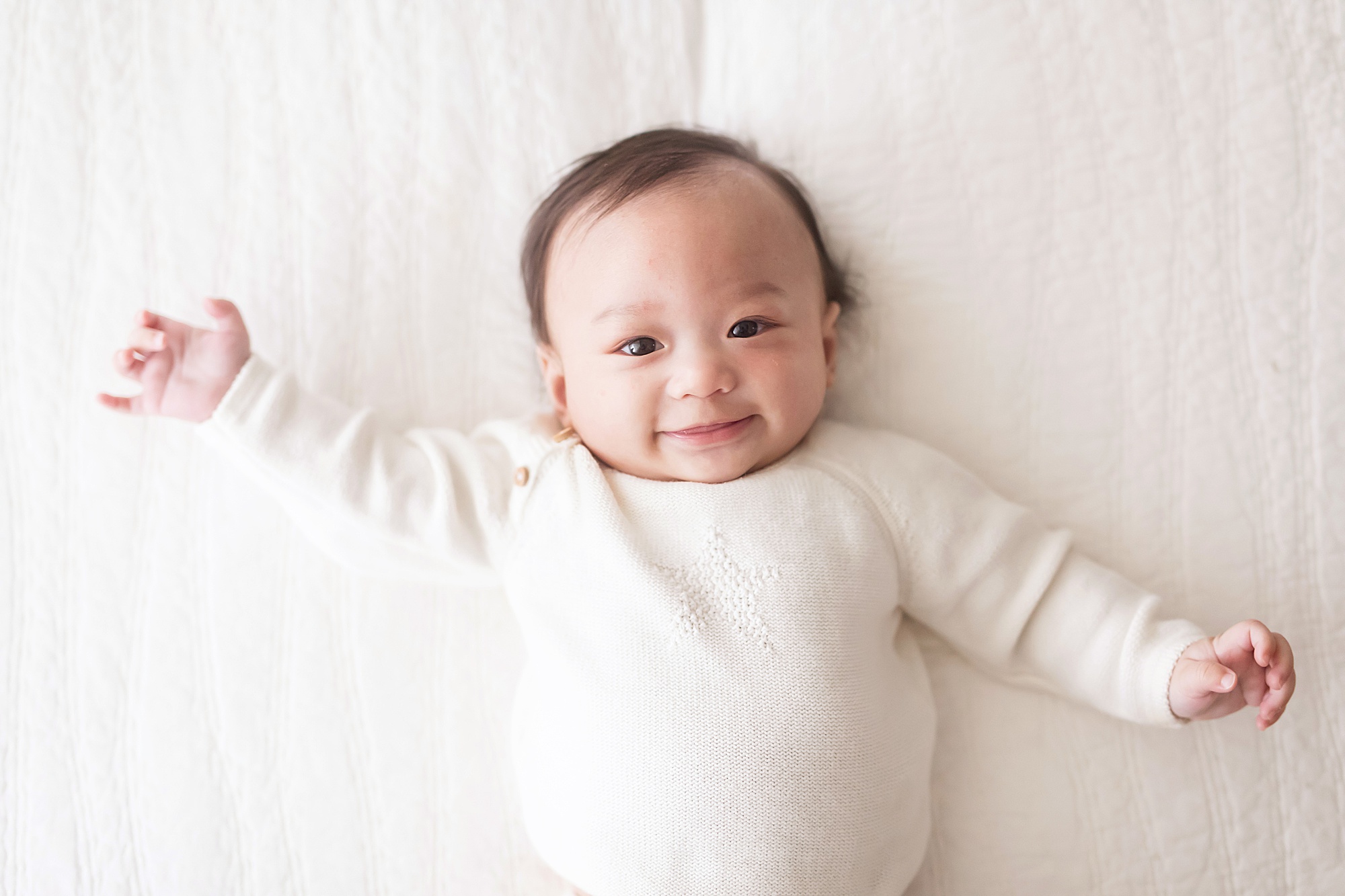 smiling 3 month old baby boy