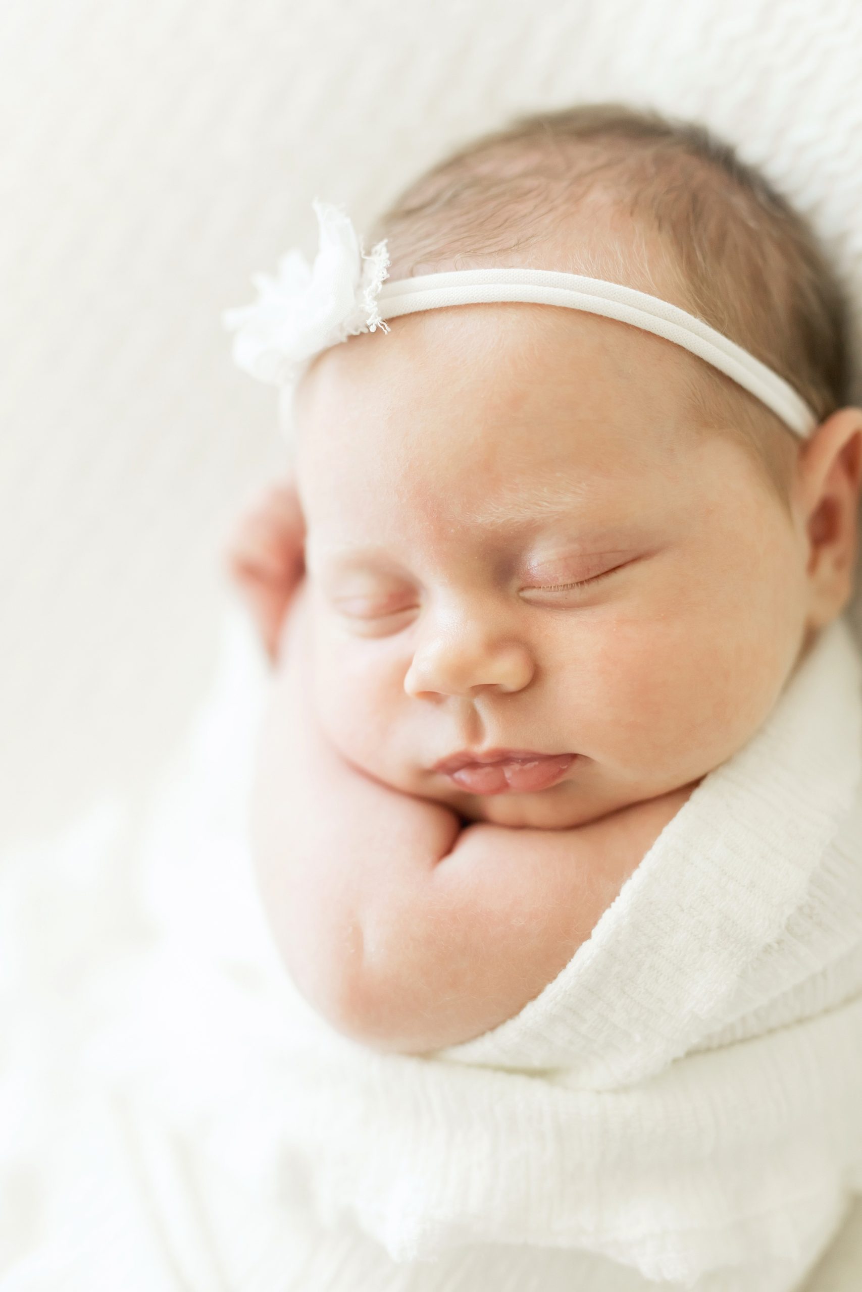 newborn sleeping at houston photography studio