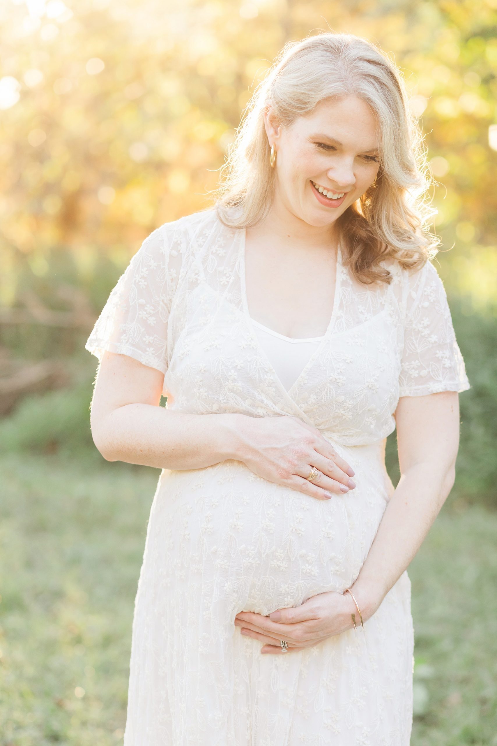 mom smiling during maternity session