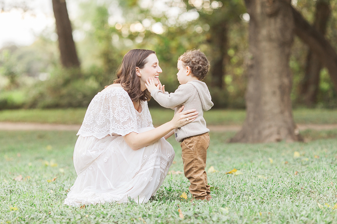 Moment between a mom and her son during a family photoshoot with Fresh Light Photography.