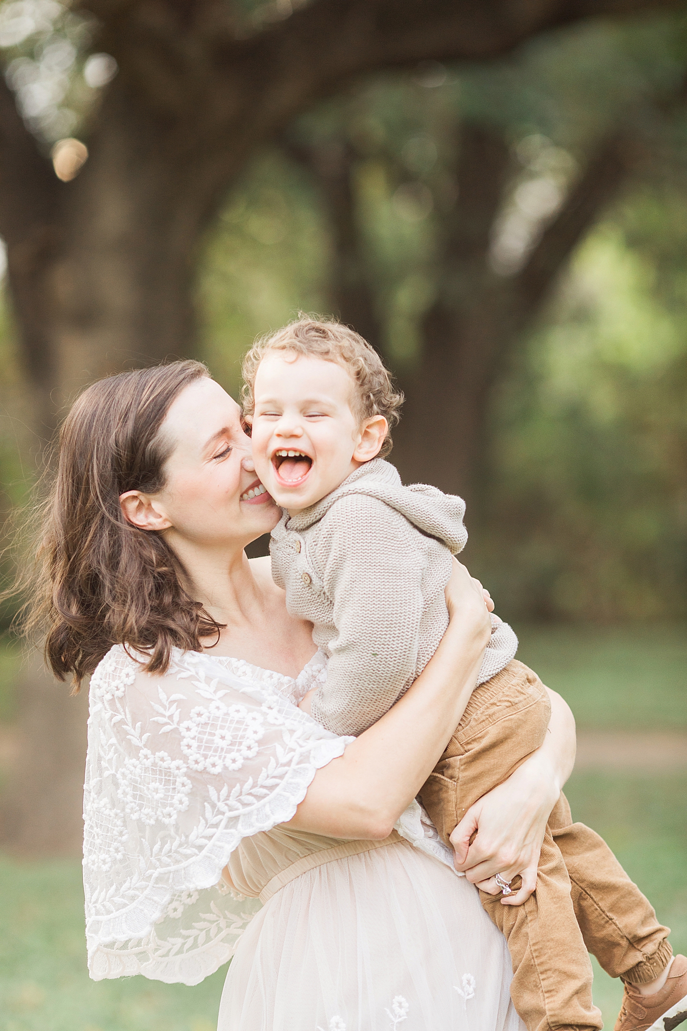 Joy-filled moment of Mom and toddler son photographed by Fresh Light Photography in The Heights. 