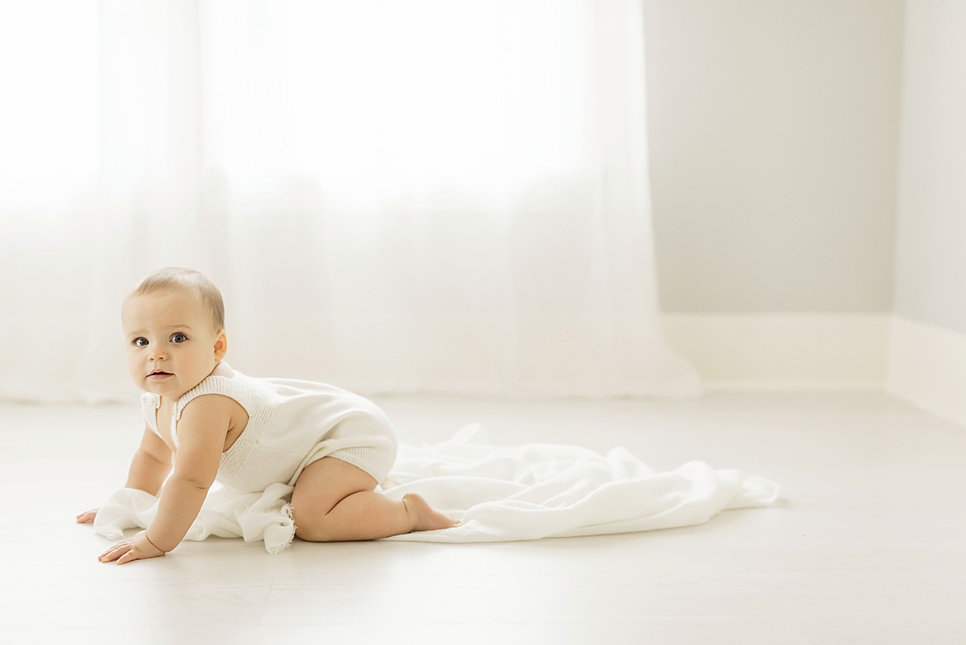 Baby crawling in studio in The Heights | Fresh Light Photography