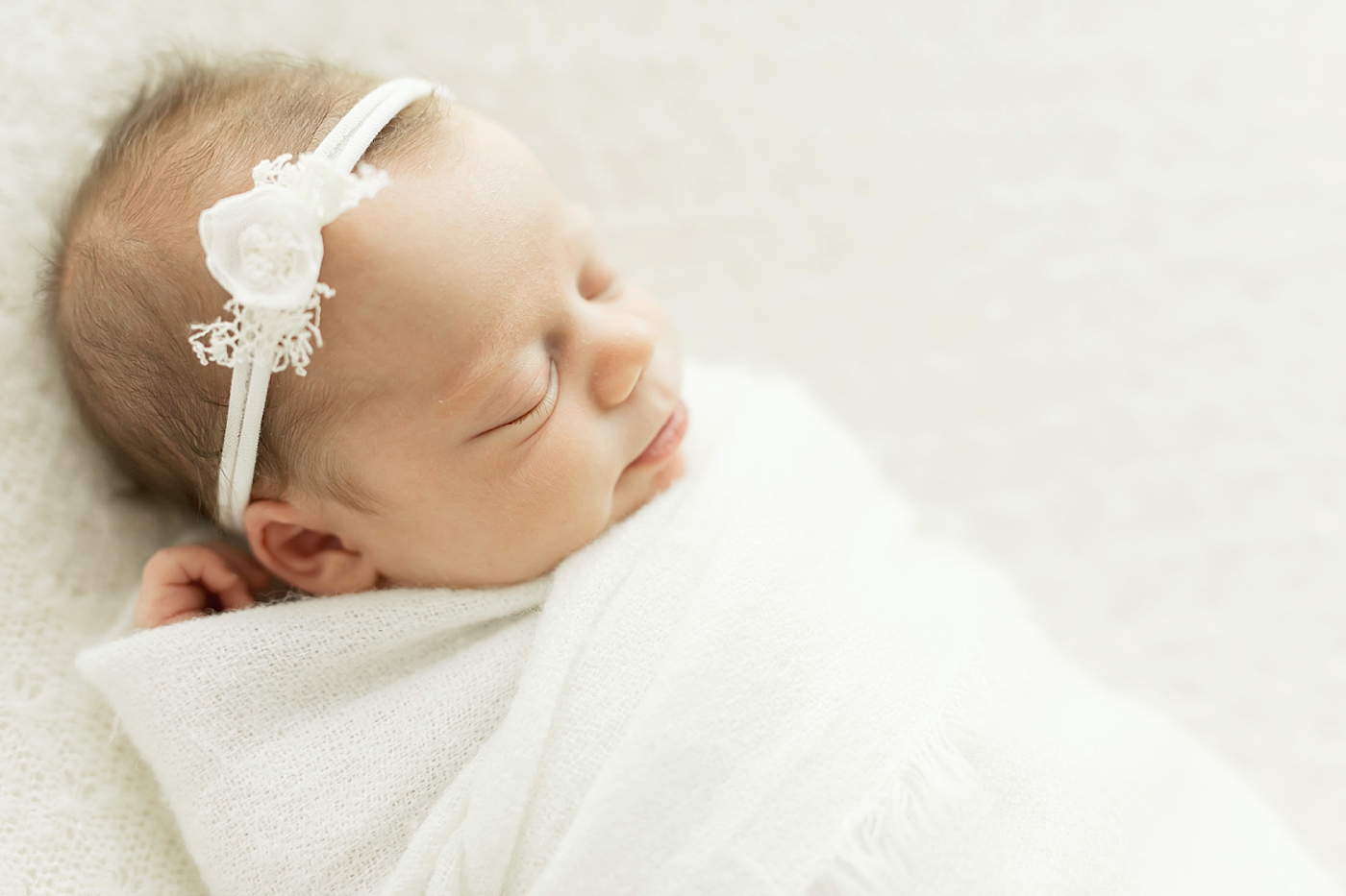 Newborn baby girls sleeping for photos with Fresh Light Photography.