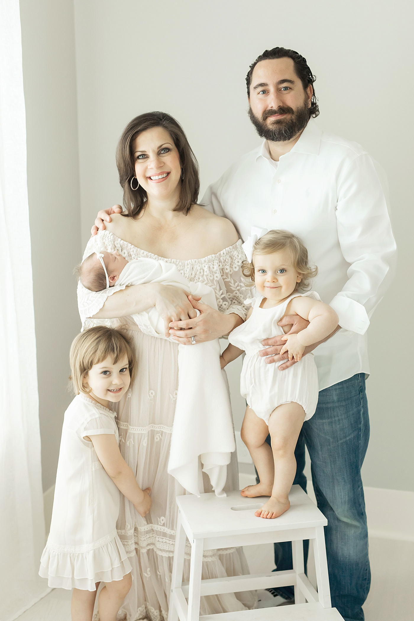 Timeless family portrait taken in Fresh Light Photography's newborn studio in The Heights. 