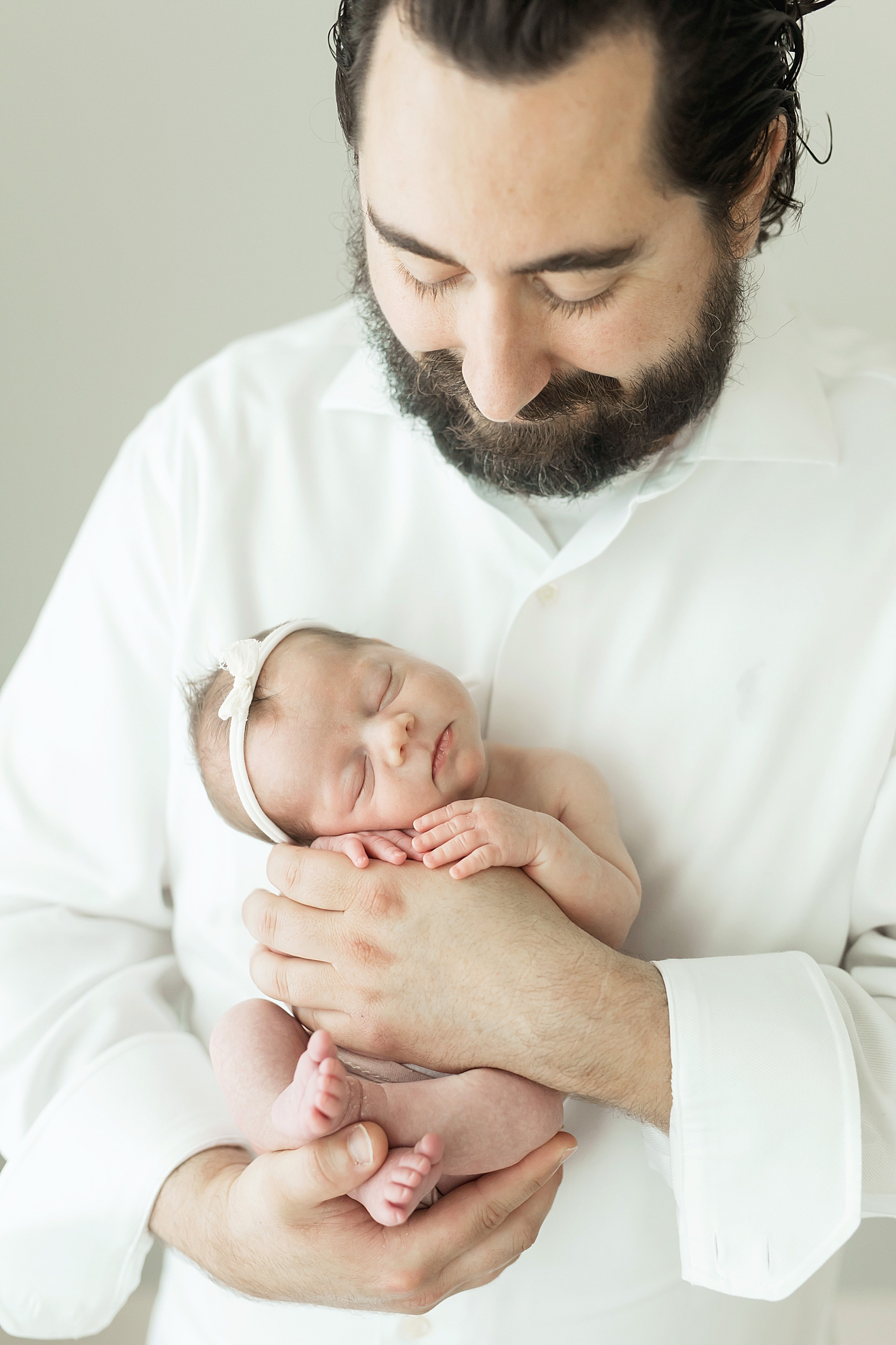 Fresh Light Photography, a Newborn Photographer in Houston photographs, Dad and his third baby girl. 