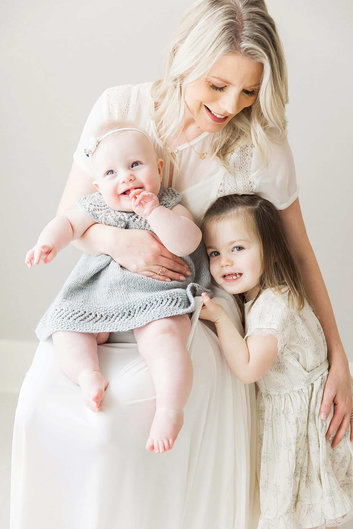 Portrait of a mom and her two daughters. Photos by Fresh Light Photography.