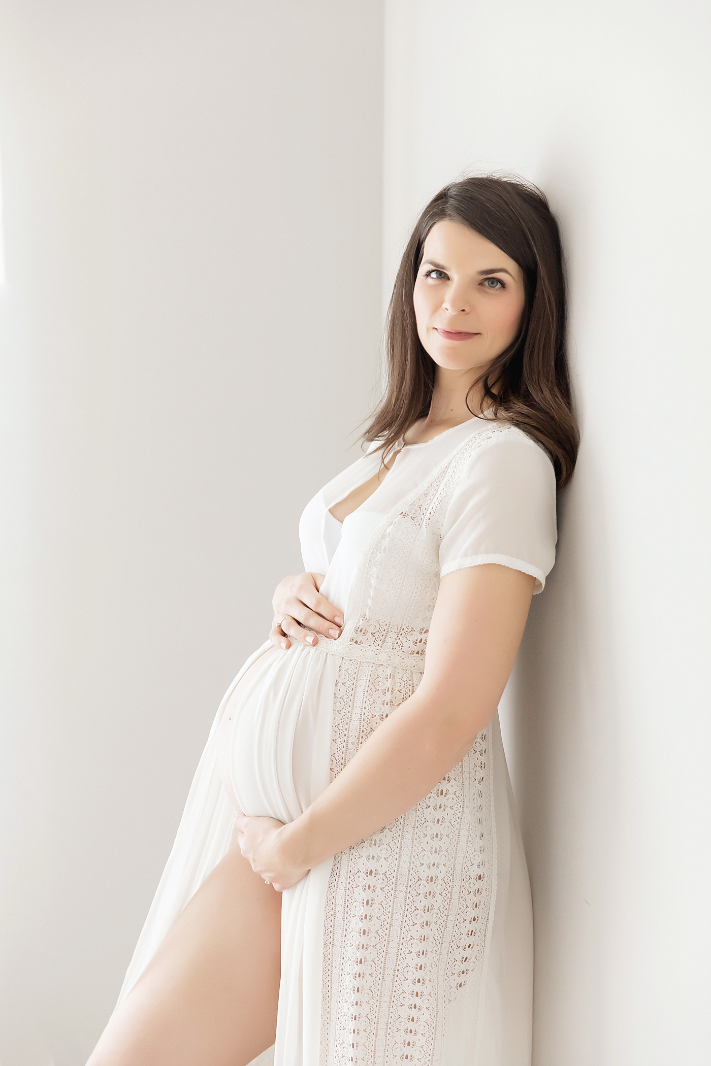 Gorgeous Mom in white maternity dress. Photos by Fresh Light Photography.