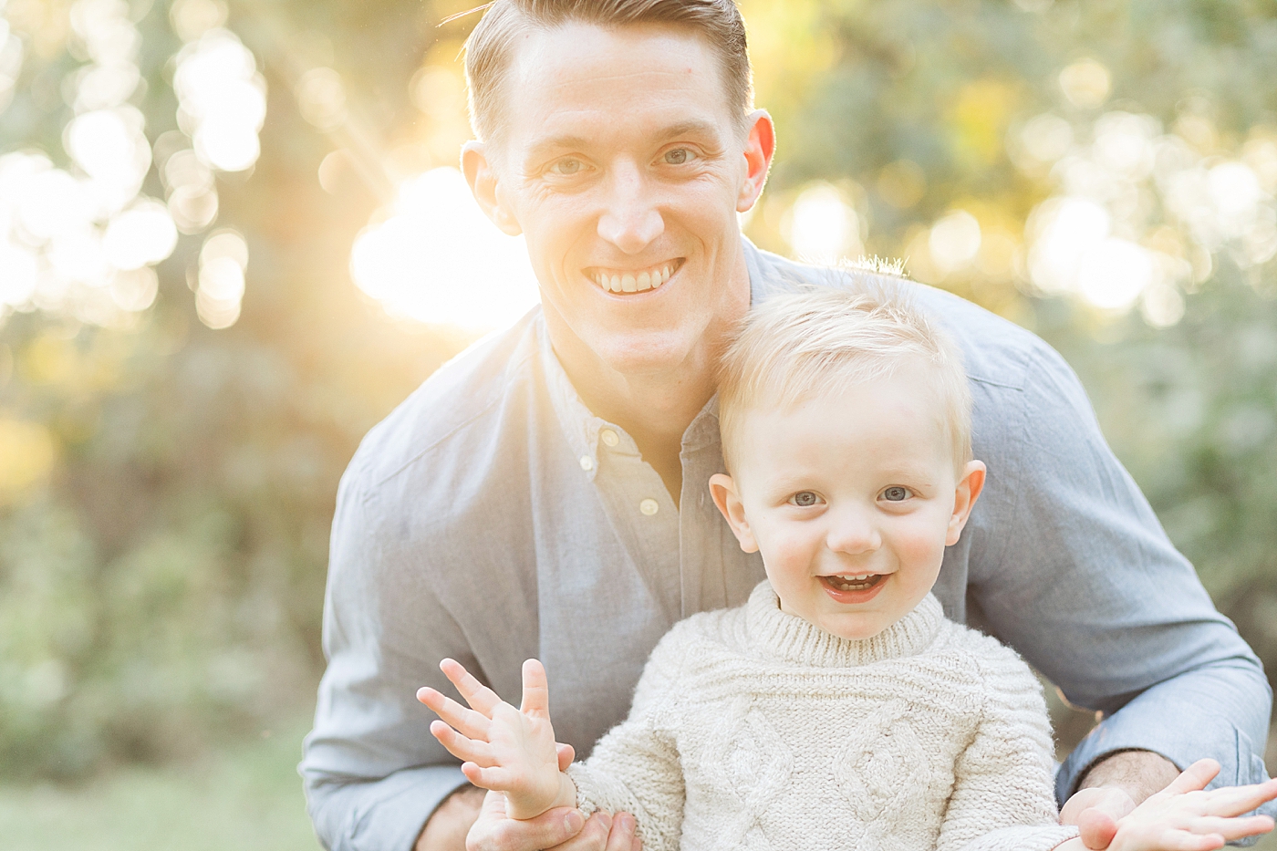 Dad with his youngest son during family photoshoot in Houston. Photo by Fresh Light Photography
