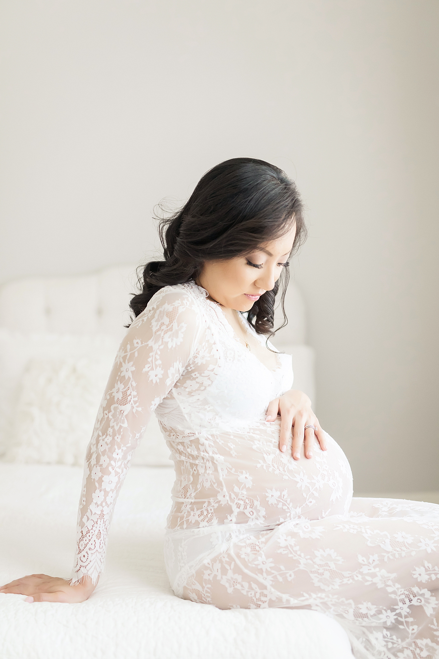 Intimate maternity portraits in studio in Houston, TX. Photos by Fresh Light Photography.