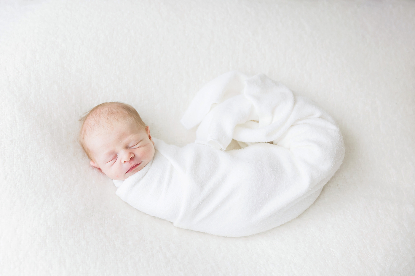 Baby boy sleeping for newborn session. Photo by Fresh Light Photography.
