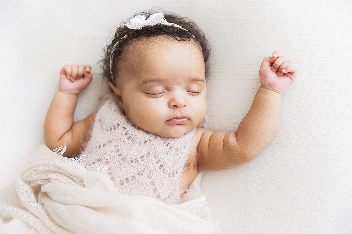 Sleeping baby girl at newborn session. Photo by Fresh Light Photography.