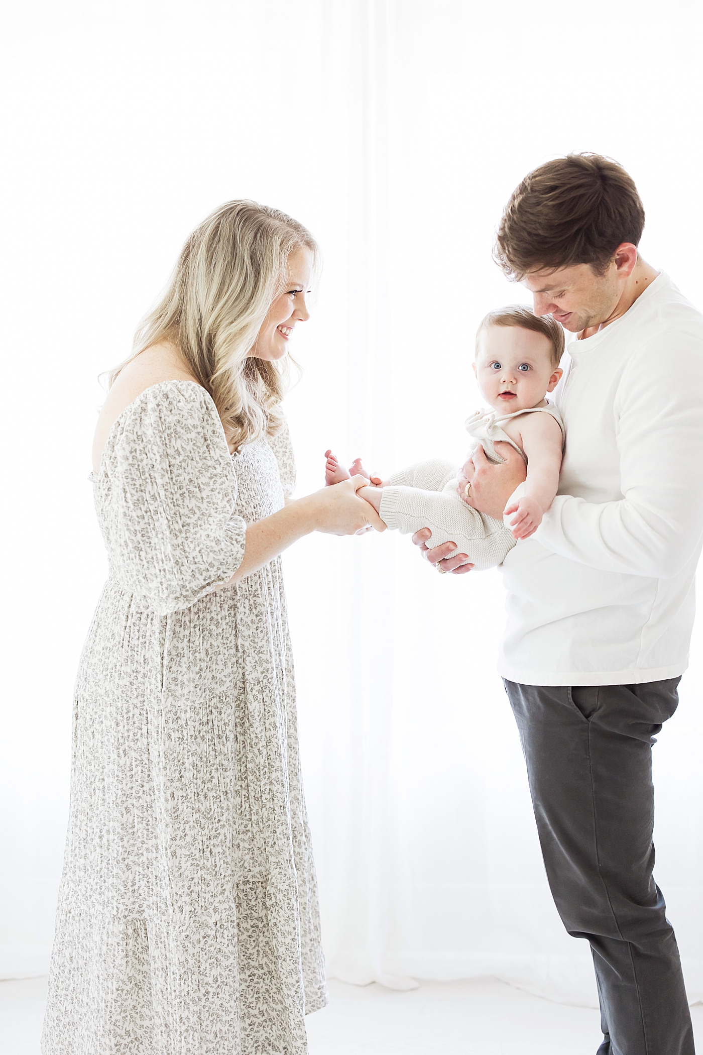 Parents playing with son in Houston Heights studio. Photo by Fresh Light Photography.