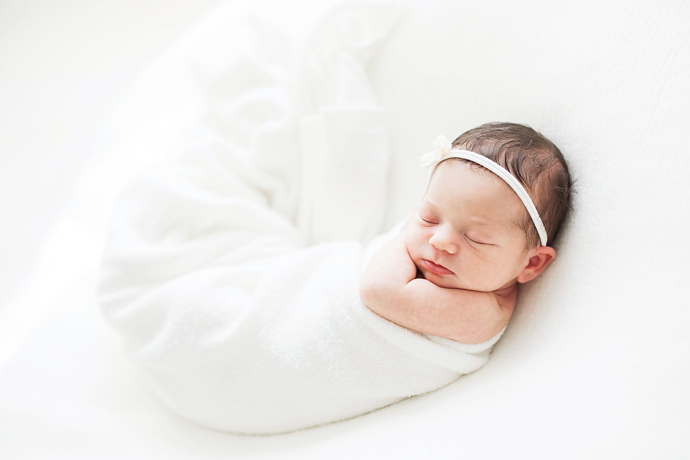 Newborn session for baby girl in studio in Houston Heights. Photo by Fresh Light Photography.
