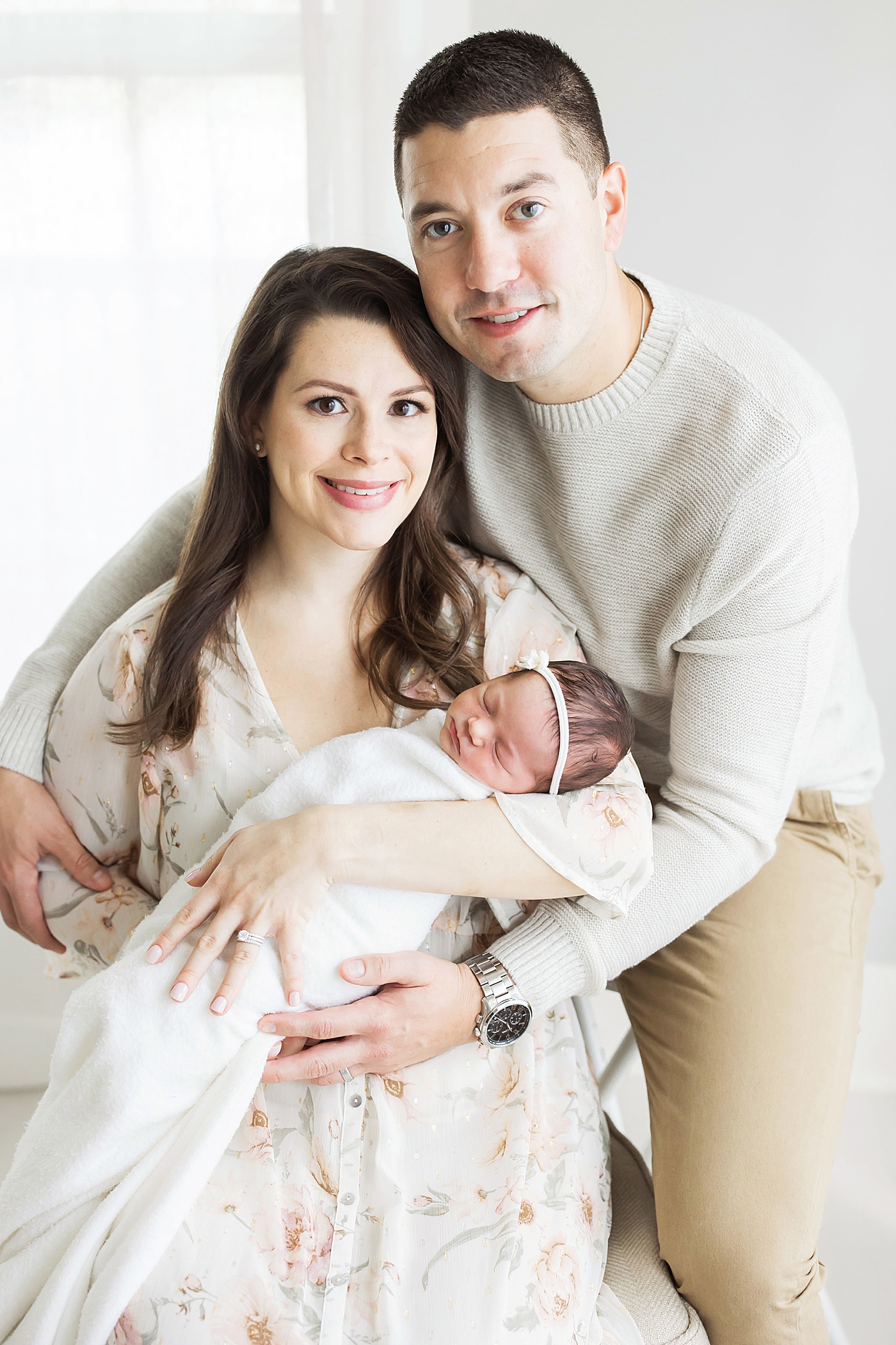 Family portrait of parents and daughter. Photo by Fresh Light Photography.
