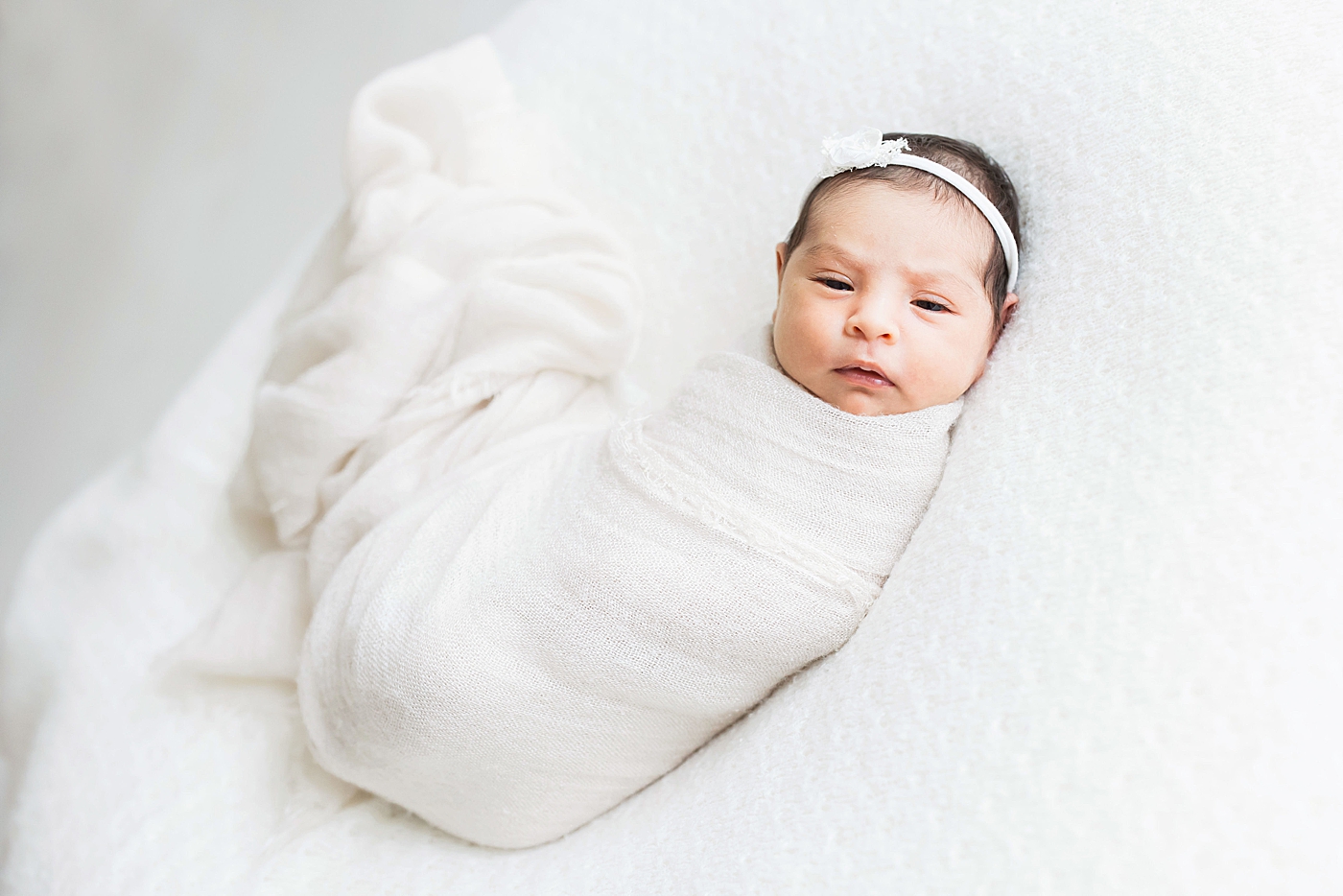 Baby awake during newborn photos. Photo by Fresh Light Photography.