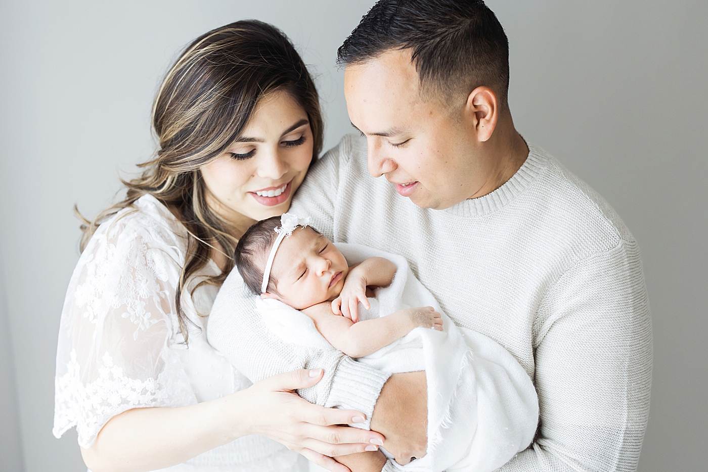 New parent with newborn daughter | Photo by Fresh Light Photography.