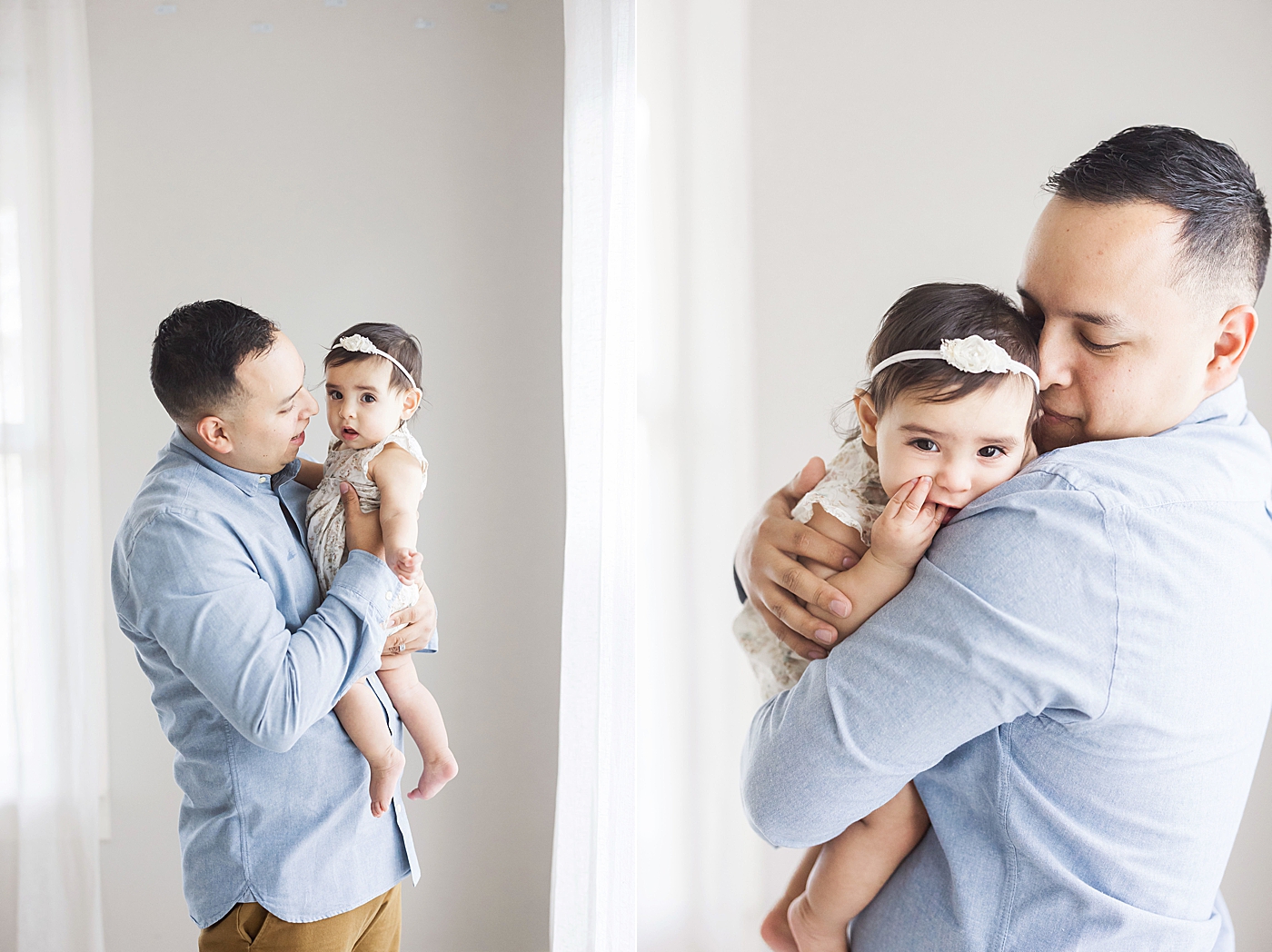 Dad holding six month old daughter. Photo by Fresh Light Photography.